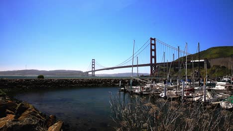 Horseshoe-Bay-Marina-with-Yachts-Overlooking-The-Golden-Gate-Bridge-Against-Beautiful-Blue-Skies