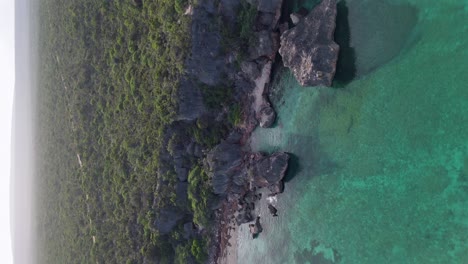 Transparent-waters-sea-along-rocky-coast-of-Jaragua-National-Park,-Pedernales-in-Dominican-Republic
