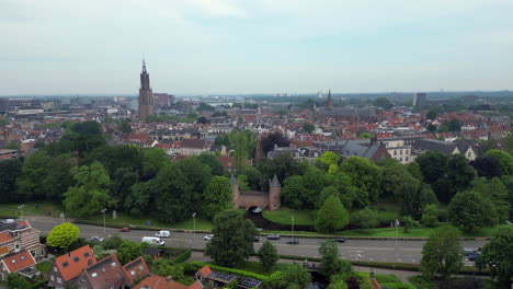 Aerial-view-of-Lieve-Vrouwe-Chruch-Tower-and-Monnikendam-Gate-at-Amersfoort-city,-the-netherlands