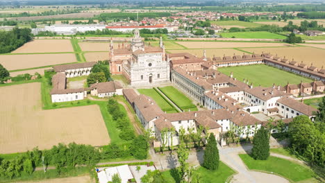 Aerial-view-of-Certosa-di-Pavia-cathedral-a-historical-monumental-complex-that-includes-a-monastery-and-a-sanctuary
