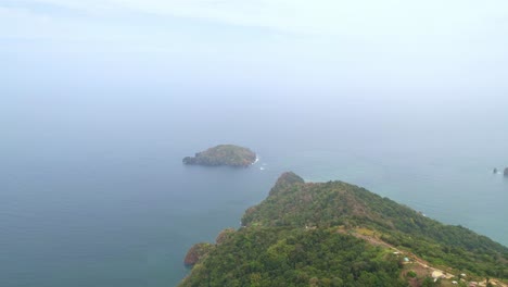 Drone-shot-of-an-islet-in-the-middle-of-an-ocean