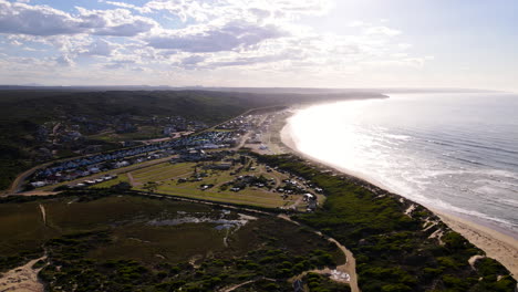 Sunrise-aerial-drone-view-of-Lappiesbaai-beach-and-Still-Bay-camping-grounds