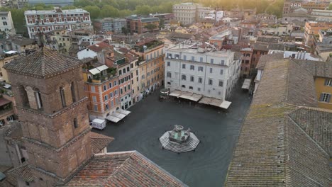 Drone-Orbita-Sobre-La-Piazza-Di-Santa-Maria-En-Trastevere,-Roma,-Italia