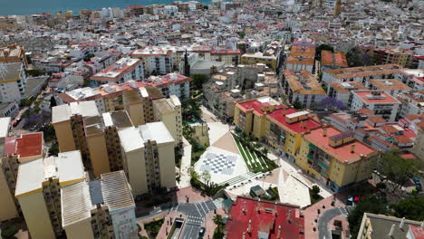 City-buildings-of-Estepona,-aerial-drone-panoramic-view