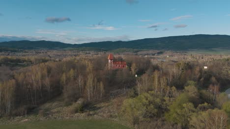 flying-towards-the-romanesque-church-of-saint-Mikuláš-in-Boletice-in-Czechia