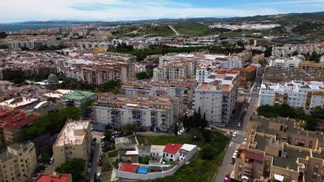 Apartment-living-buildings-of-Estepona-city,-aerial-panoramic-view