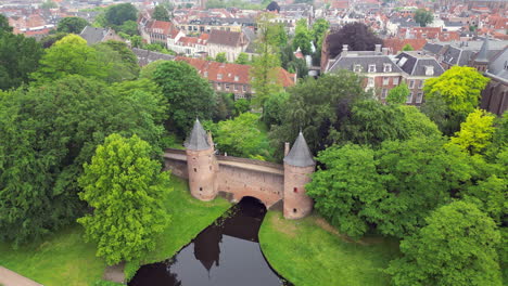 Aerial-view-of-Lieve-Vrouwe-Chruch-Tower-and-Monnikendam-Gate-at-Amersfoort-city,-the-netherlands