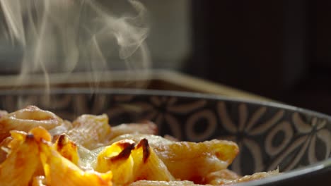 Close-Up-View-of-Delicious-Hot-Tomato-Pasta-with-Backlit-Steam-Rising