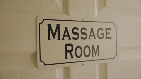 The-door-of-the-room-at-the-massage-center-is-labeled-"Massage-Room