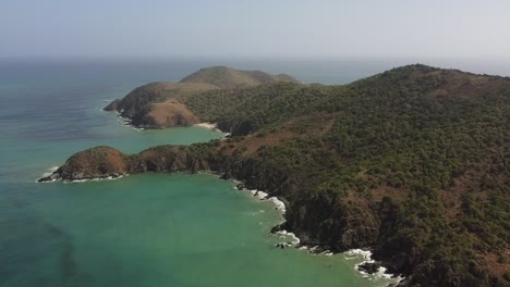 Drone-wide-shot-of-idyllic-coastline-at-beach-or-Manzanillo-in-Venezuela