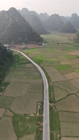 Aerial-View,-Vietnam---Rural-Landscape-with-Karst-Mountains-in-Cao-Bang,-vertical