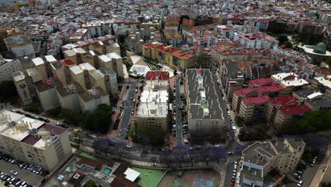 Downtown-of-Estepona-city,-high-angle-drone-view