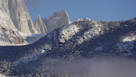 Timelapse-of-clouds-slowly-moving-atop-snowy-mountains-in-Patagonia,-Argentina