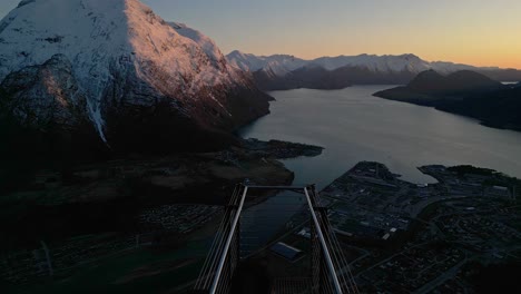 Man-walk-on-the-Rampestreken-viewing-platform,-Norway