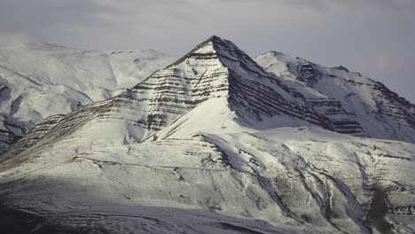 Cloud-shadows-move-atop-Cerro-Piramide-peak-in-Patagonia,-Argentina