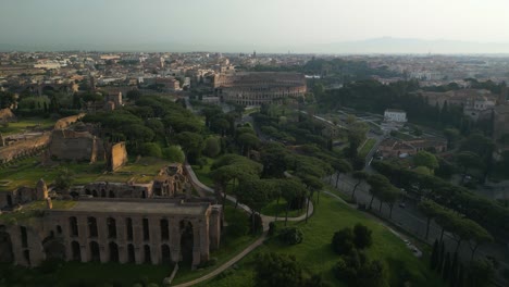 Drone-Flies-Away-from-Roman-Colosseum-to-Reveal-Palatine-Hill