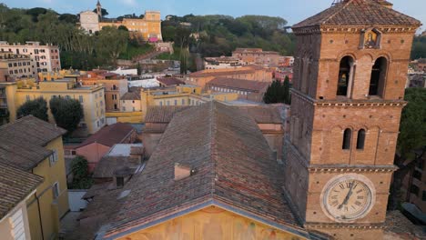 Backwards-Drone-Shot-Reveals-Piazza-di-Santa-Maria-in-Trastevere,-Rome,-Italy