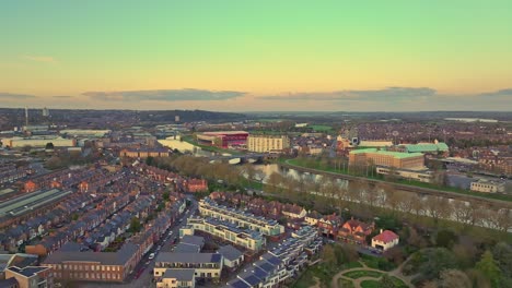An-aerial-spring-shot-from-The-Meadows-district-with-good-visibility-of-still-River-Trent,-Trent-Bridge,-and-Nottinghamshire-Local-Government