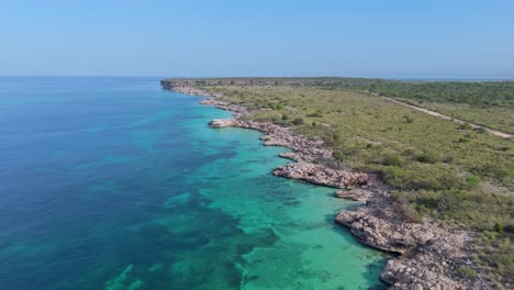 Beautiful-rocky-coastline-of-Cabo-Rojo-with-turquoise-Caribbean-Sea-and-corals-underwater