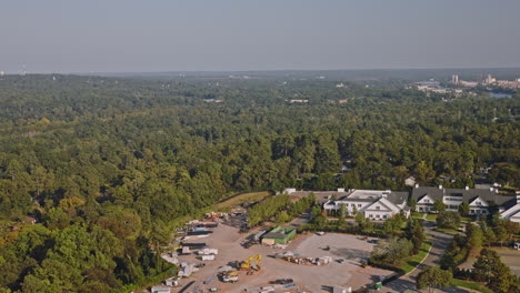 Augusta-Georgia-Aerial-v33-drone-flyover-National-Hills-capturing-the-construction-progress-at-the-Global-Broadcast-Compound-of-the-National-Golf-Club---Shot-with-Inspire-3-8k---October-2023