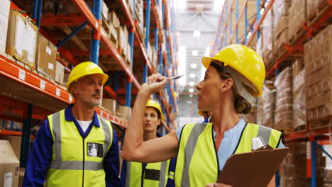 Warehouse-worker-showing-warehouse