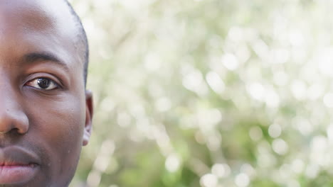 A-close-up-of-an-African-American-man-with-a-thoughtful-expression,-with-copy-space