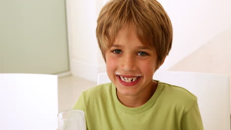 Little-boy-drinking-a-glass-of-milk