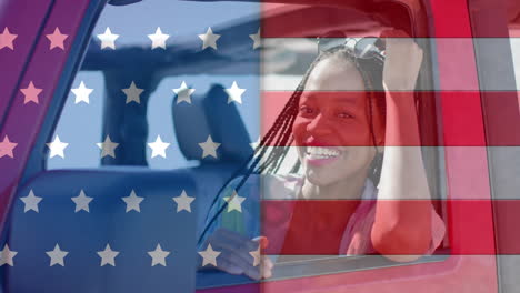 Animation-of-flag-of-usa-over-happy-african-american-woman-in-car-by-beach-in-summer