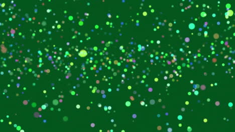 Animation-of-glowing-light-spots-over-green-background