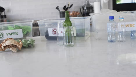 Various-recyclables-are-sorted-on-a-kitchen-counter