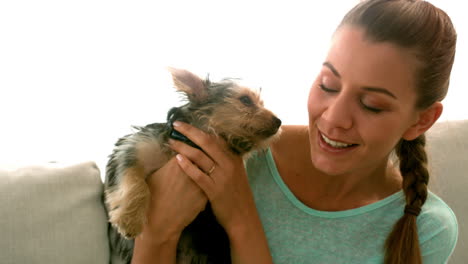 Woman-holding-her-puppy