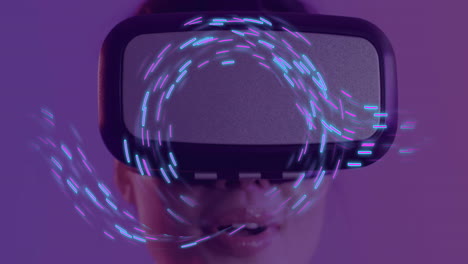 Animation-of-purple-shapes-moving-over-caucasian-woman-using-vr-headset