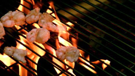 Prawns-being-cooked-on-flaming-barbecue