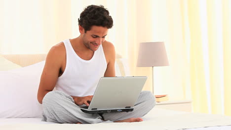 Casual-man-using-his-laptop