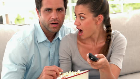 Couple-watching-something-shocking-on-tv