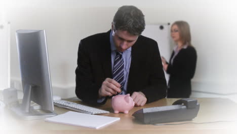 Businessman-putting-money-in-his-piggybank