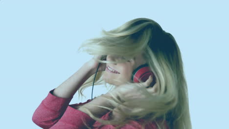Animation-of-caucasian-woman-listening-to-music-with-headphones-and-red-pattern-moving
