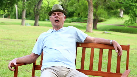 Retired-man-dozing-on-a-park-bench