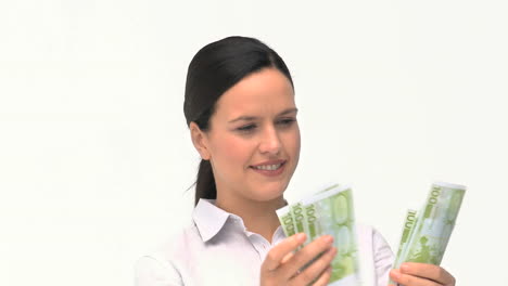 A-businesswoman-counting-her-money