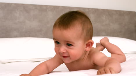 Cute-baby-on-a-bed