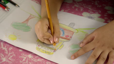 boy-draws-quietly-lying-in-bedroom-room-at-home