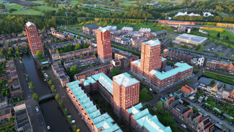 Aerial-view-at-golden-hour-with-modern-buildings-at-Amersfoort-Vathorst,-The-Netherlands