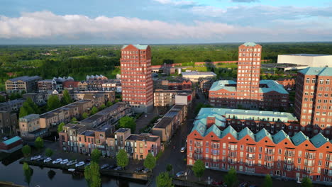 Aerial-view-at-golden-hour-with-modern-buildings-at-Amersfoort-Vathorst,-The-Netherlands