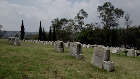 Drone-shot-of-a-MExico-city-pantheon,-memorial,-day-of-deaths,-graveyard,-cementery