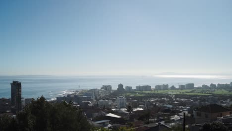 Coastal-town-on-a-sunny-morning-boat-floating-gently,-Cape-Town-4K