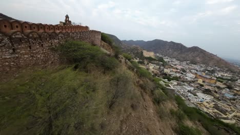 Fpd-aerial-view-of-the-historical-wall-of-Jaipur-Rajasthan-near-slum-and-historical-old-town