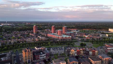 Aerial-view-at-golden-hour-with-modern-buildings-at-Amersfoort-Vathorst,-The-Netherlands