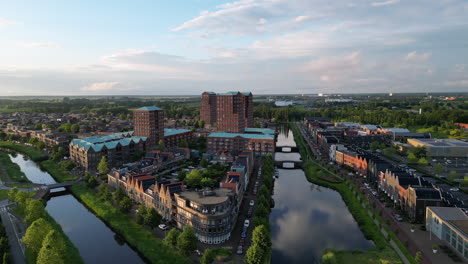 Aerial-view-at-golden-hour-with-modern-buildings-at-Amersfoort-Vathorst,-The-Netherlands