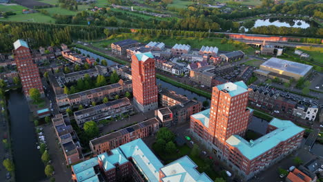 Aerial-view-at-golden-hour-with-modern-buildings-at-Amersfoort-Vathorst,-The-Netherlands