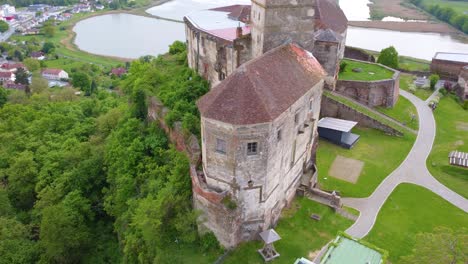 Cinematic-Panning-Aerial-Shot-of-Slovenska-Bistrica-in-Slovenia-in-a-Small-Village-with-Ponds-and-Parks-Nearby